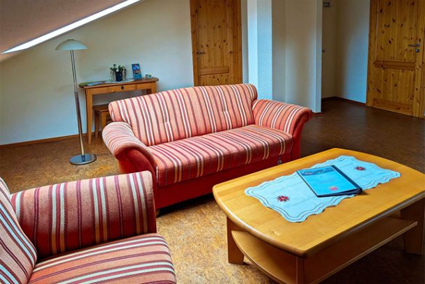 Flachshof Ferienwohnung Kornkammer - Wohnbereich